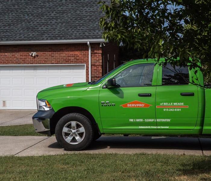 SERVPRO truck next to house