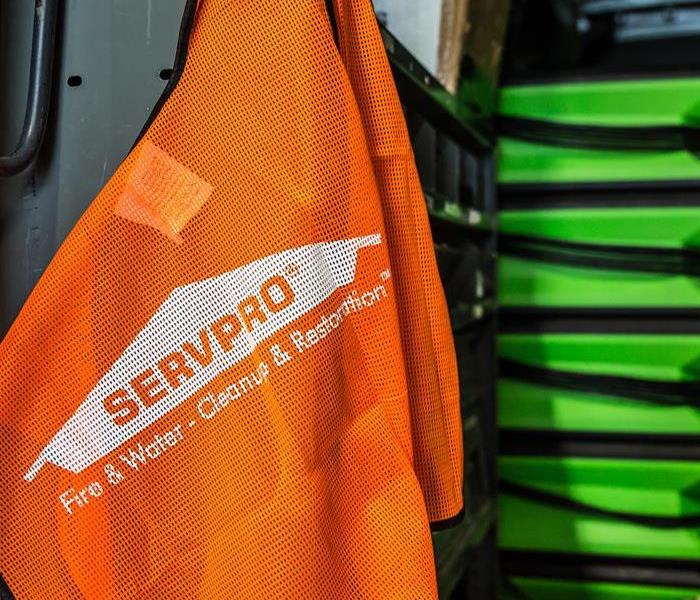 The orange SERVPRO vest hangs on the shelf as a reminder of our mission!