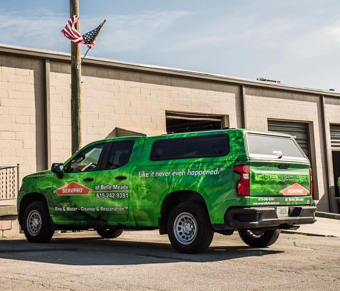 SERVPRO truck next to commercial building